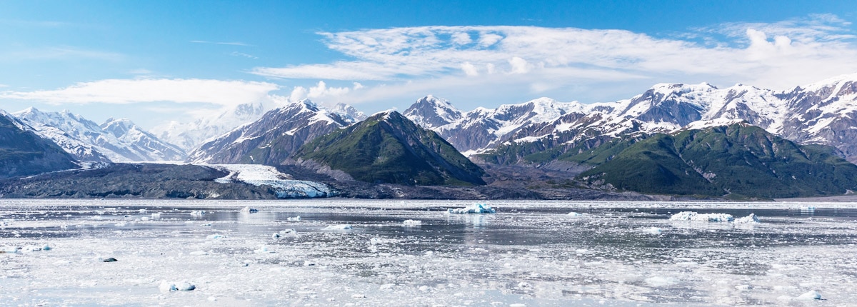 A view of snow capped mountains by Hubbard Glacier
