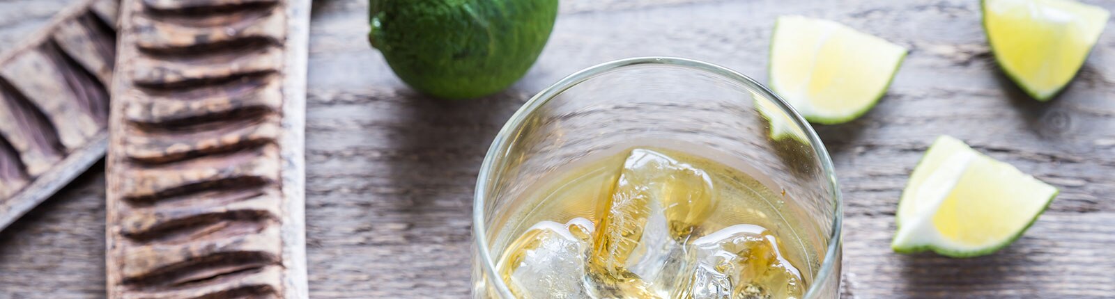 Up close and personal in Grenada with a fresh rum drink paired with cut limes