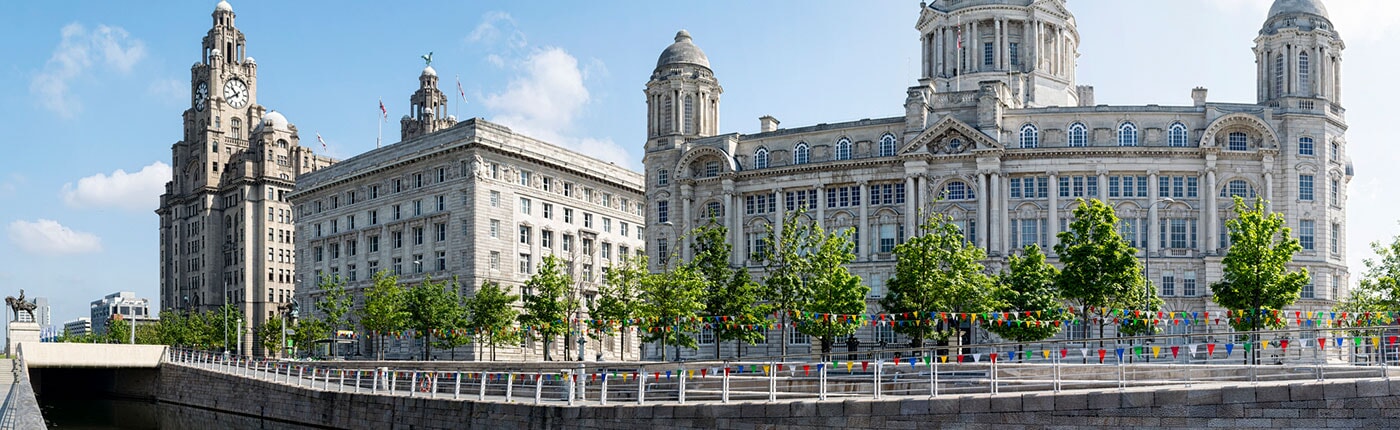 the three graces by the waterfront in liverpool, england
