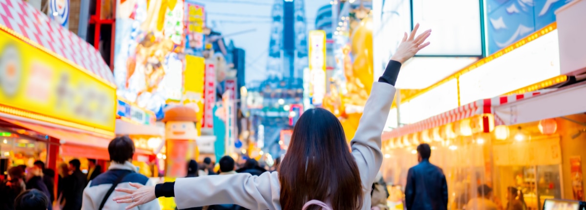 view of the bright lights and tourist visiting kyoto japan