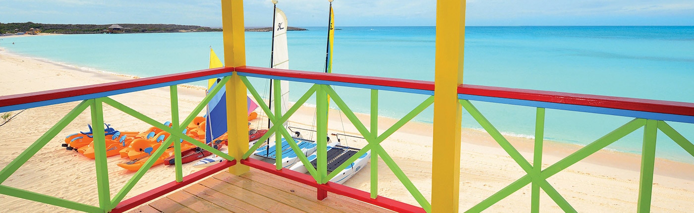 view of the crystal blue ocean from a villa on half moon cay