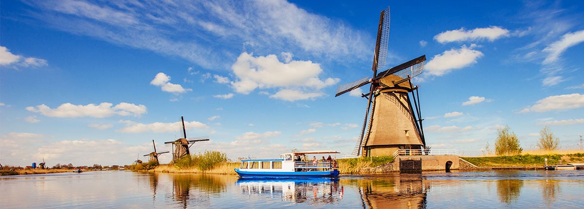 traditional dutch windmills from the channel in rotterdam