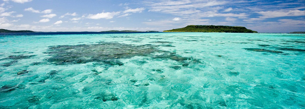 the ocean with different islands in the background