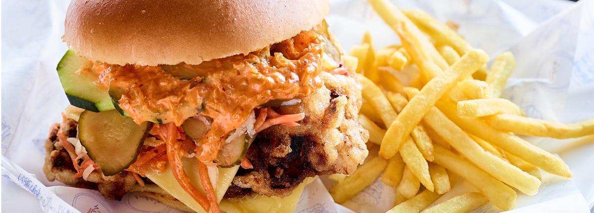 fries and a burger are ready to be served to guests