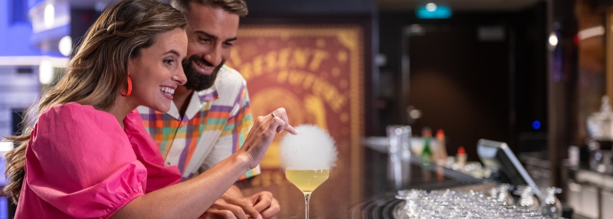 guests enjoying a bubbly cocktail at the fortune teller bar