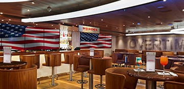 view of the heroes tribute bar onboard carnival panorama