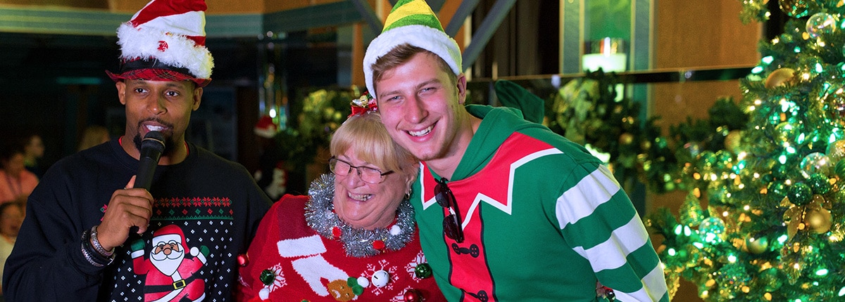 a woman enjoying the holidays with carnival entertainer