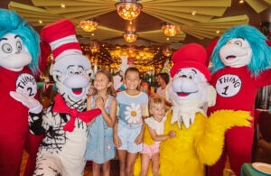 Kids taking a photograph with Dr. Seuss